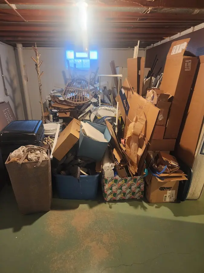 Roll-off dumpster container at job site for 2 Yard Dumpster Rental in Shady Side